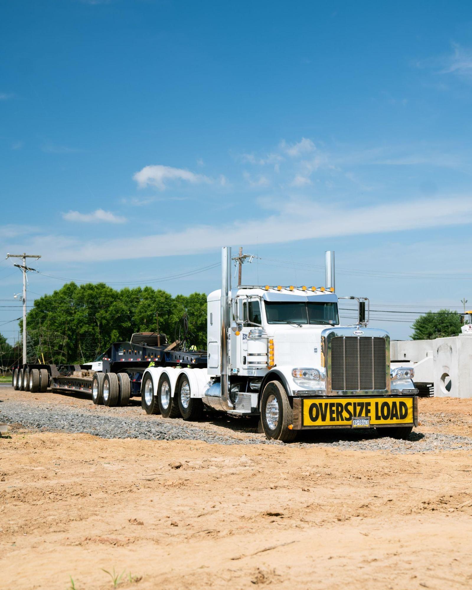B. Blair oversize load Peterbilt on job site